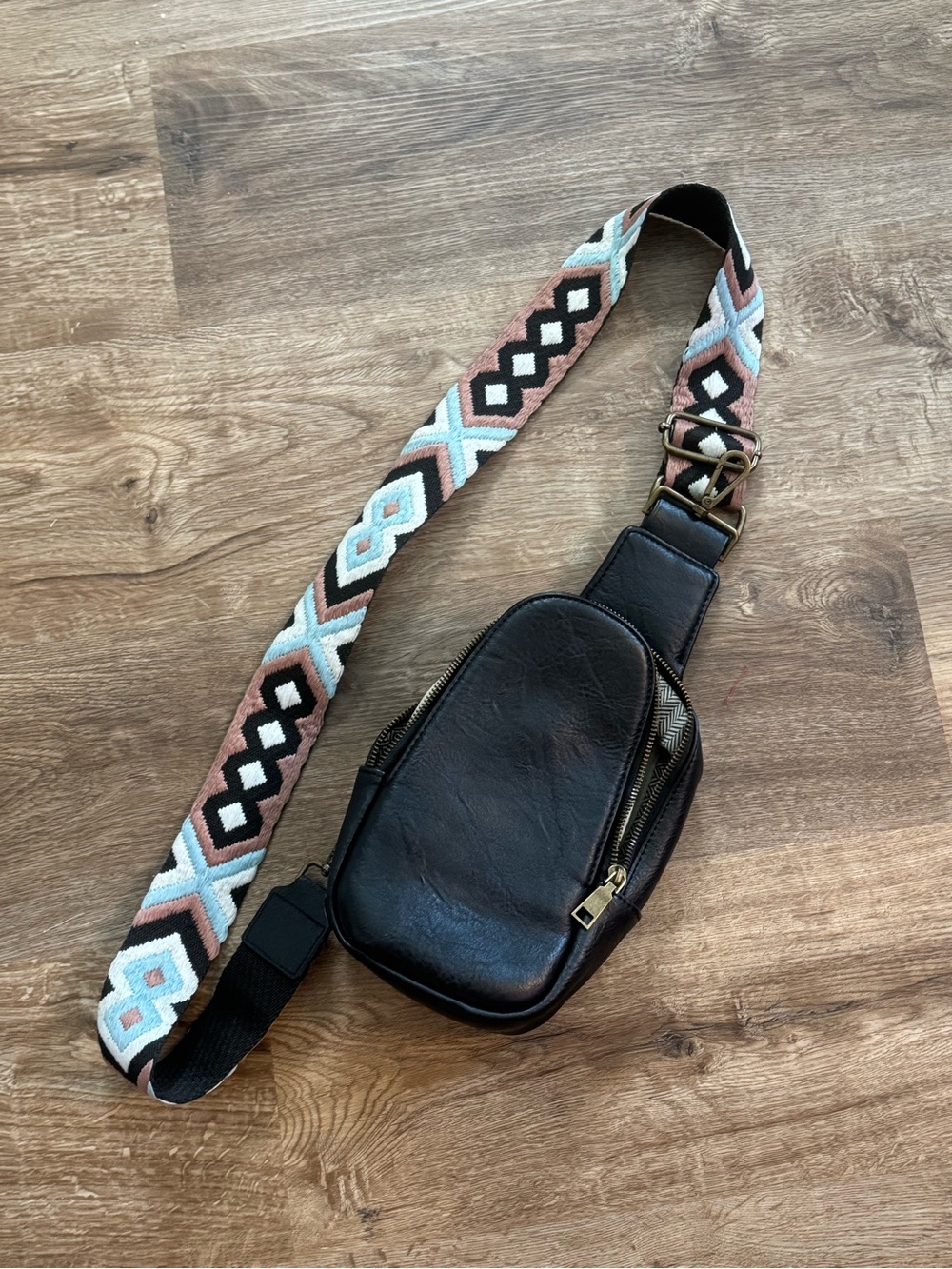 Black Leather Crossbody Sling Bag with Patterned Strap